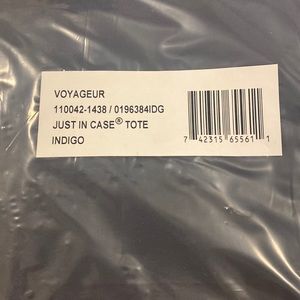 NWT - never opened TUMI indigo (navy blue) “just in case” tote.